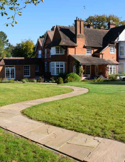 laurel-hill-gardens-burrows-hill-rear-garden-with-house-view